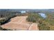 Panoramic aerial view of new community development next to a marina and waterfront with mature tree coverage at 600 Belshire Dr, Acworth, GA 30102