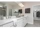 Modern bathroom with dual sinks, quartz countertop, walk-in shower, and stylish fixtures at 600 Belshire Dr, Acworth, GA 30102