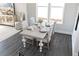 Stylish dining room with hardwood floors, designer furniture and decor, and lots of natural light at 600 Belshire Dr, Acworth, GA 30102