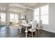 Bright dining room with large windows and a modern chandelier at 600 Belshire Dr, Acworth, GA 30102