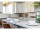 Kitchen featuring an island with white countertops and modern lighting at 600 Belshire Dr, Acworth, GA 30102