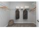 Organized walk-in closet with wire shelving and ample storage space for clothing and accessories at 600 Belshire Dr, Acworth, GA 30102