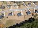 An aerial view shows the home's location in a neighborhood of similar homes with mature landscaping at 112 Standford Dr, Mcdonough, GA 30252