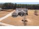 Aerial view of a beautiful home with a long driveway and well-maintained landscaping at 112 Standford Dr, Mcdonough, GA 30252