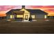 Twilight view of a large backyard with a pergola-covered hot tub and barbecue setup at 112 Standford Dr, Mcdonough, GA 30252