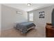 Cozy bedroom with carpet, a neutral color palette and a window at 112 Standford Dr, Mcdonough, GA 30252