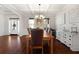 Dining room with hardwood floors and coffered ceiling with great natural light at 112 Standford Dr, Mcdonough, GA 30252