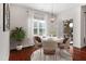 Cozy dining room featuring a decorative light fixture and modern decor at 112 Standford Dr, Mcdonough, GA 30252