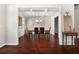 Dining room with hardwood floors, coffered ceiling, and stylish decor at 112 Standford Dr, Mcdonough, GA 30252