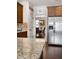 Modern kitchen with granite countertops, stainless steel appliances, and custom cabinetry at 112 Standford Dr, Mcdonough, GA 30252