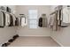 Spacious walk-in closet with ample hanging space and shelving at 112 Standford Dr, Mcdonough, GA 30252