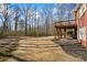 The backyard features a deck with stairs, creating a private oasis in a serene setting at 7455 Richmond Way, Cumming, GA 30040