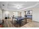 Beautiful game room with a ping pong table, wet bar and recessed lighting at 7455 Richmond Way, Cumming, GA 30040
