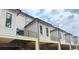 Rear exterior elevation showcasing individual balconies and garages below the townhouses at 001 White St # 1, Marietta, GA 30060