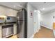 Well-lit kitchen features stainless steel appliances and laminate wood floors at 1501 Clairmont Rd # 535, Decatur, GA 30033