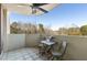 Relaxing outdoor patio featuring a table, chairs, and a scenic view of the surrounding lush landscape at 1501 Clairmont Rd # 535, Decatur, GA 30033