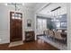 Elegant dining room with hardwood floors, modern lighting, and stylish decor for entertaining guests at 2061 Westwood Cir, Smyrna, GA 30080