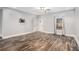 Spacious bedroom with hardwood flooring, a ceiling fan, and natural light at 210 Joe Green Ln, Canton, GA 30114