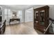 Bright living room features hardwood floors, neutral paint, and custom bookshelves at 4000 Rockingham Dr, Roswell, GA 30075