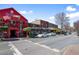 Charming street view showcasing the local restaurants, shops, and tree-lined sidewalks creating a vibrant atmosphere at 4000 Rockingham Dr, Roswell, GA 30075