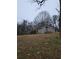 View of the exterior of the home and surrounding lot at 5709 Lee St, Morrow, GA 30260