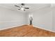 Open dining room area with wood floors and view to kitchen at 6851 Roswell Rd # F32, Sandy Springs, GA 30328