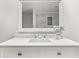 Bathroom featuring a single sink with a white marbled countertop and modern fixtures at 6851 Roswell Rd # F32, Sandy Springs, GA 30328