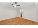 Dining area with hardwood floors and view into the kitchen at 6851 Roswell Rd # F32, Sandy Springs, GA 30328