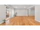 Spacious living area featuring hardwood floors, neutral walls, and sliding glass doors at 6851 Roswell Rd # F32, Sandy Springs, GA 30328