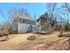 Lovely backyard with a large deck, mature trees, and privacy fencing at 893 Lance Cir, Lawrenceville, GA 30043