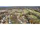 Aerial view of the home in a neighborhood near a golf course at 108 Ardsley Run, Canton, GA 30115