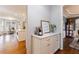 Breakfast nook with marble countertop, storage cabinets, and a coffee machine adjacent to dining area at 108 Ardsley Run, Canton, GA 30115