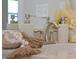 This bathroom features a modern faucet, decorative soap dispensers, and neutral accents at 1322 Stanley Park Dr, Decatur, GA 30033