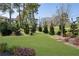 Relax in this gorgeous manicured green space with mature landscaping at 1322 Stanley Park Dr, Decatur, GA 30033