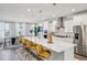 Spacious kitchen with quartz countertops, a large island, and modern stainless steel appliances at 1322 Stanley Park Dr, Decatur, GA 30033