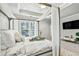 Main bedroom with four-poster bed and sliding glass door at 1322 Stanley Park Dr, Decatur, GA 30033