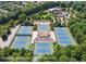 Aerial view of the many community tennis courts with stadium seating at 1322 Stanley Park Dr, Decatur, GA 30033