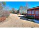 Spacious backyard with a shed and access to a screened porch at 3064 Zermatt Way, Snellville, GA 30078