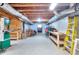 Unfinished basement with exposed beams, ductwork, concrete floor, and ample space for storage or workshop at 3064 Zermatt Way, Snellville, GA 30078