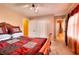 Bedroom showcasing a decorative bed frame, and ensuite bathroom at 3064 Zermatt Way, Snellville, GA 30078