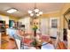 Bright dining area with hardwood floors, white trim and large windows at 3064 Zermatt Way, Snellville, GA 30078