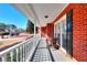 Inviting front porch with seating, offering a relaxing outdoor space with view of neighborhood at 3064 Zermatt Way, Snellville, GA 30078