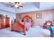 Spacious main bedroom features a trey ceiling, carpet and classic furnishings at 3064 Zermatt Way, Snellville, GA 30078