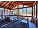 Outdoor seating area with screened porch and ceiling fan at 3064 Zermatt Way, Snellville, GA 30078