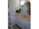 Bathroom features vintage vanity, linoleum countertop, and neutral accents at 4765 Fellswood Dr, Stone Mountain, GA 30083