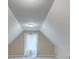 Vaulted bedroom with neutral walls and plush carpet is filled with natural light at 2477 Misty Rose Ln, Loganville, GA 30052