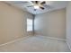 Bedroom featuring carpet, a window, and neutral walls at 2477 Misty Rose Ln, Loganville, GA 30052