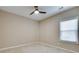 Bedroom featuring a ceiling fan, carpet and a window at 2477 Misty Rose Ln, Loganville, GA 30052