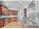 Well-equipped kitchen features stainless steel appliances and granite countertops at 2477 Misty Rose Ln, Loganville, GA 30052