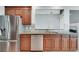 Contemporary kitchen with stainless steel appliances and breakfast bar at 2477 Misty Rose Ln, Loganville, GA 30052